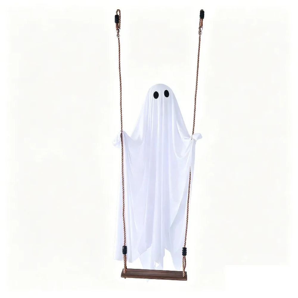 White Halloween ghost on its wooden swing