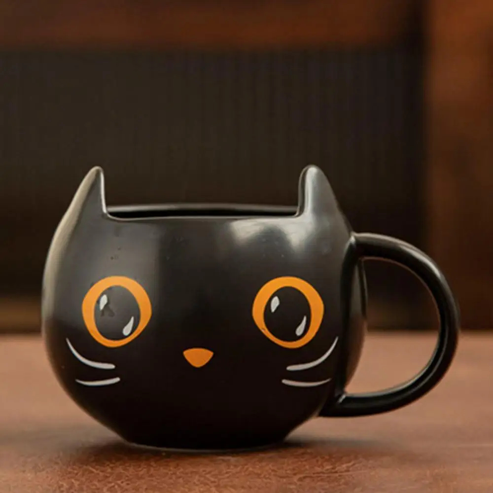 Black cat mug with orange eyes, without lid