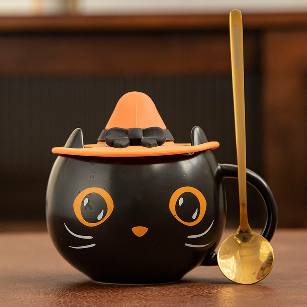 Black cat mug with hat lid and golden spoon