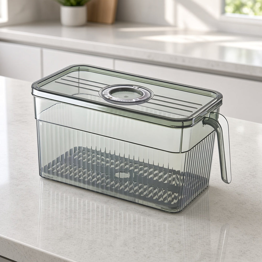 Clear storage box with handle, lid and drain tray on a kitchen countertop